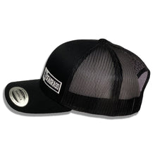 Load image into Gallery viewer, Seagrass Clothing Co. Black on Black Trucker Hat with White Logo Side View
